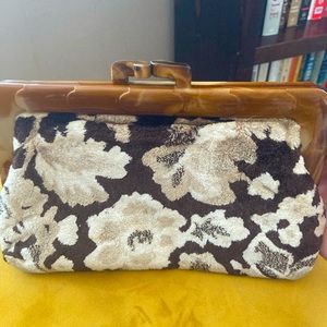 Vintage Clutch with snap closure.